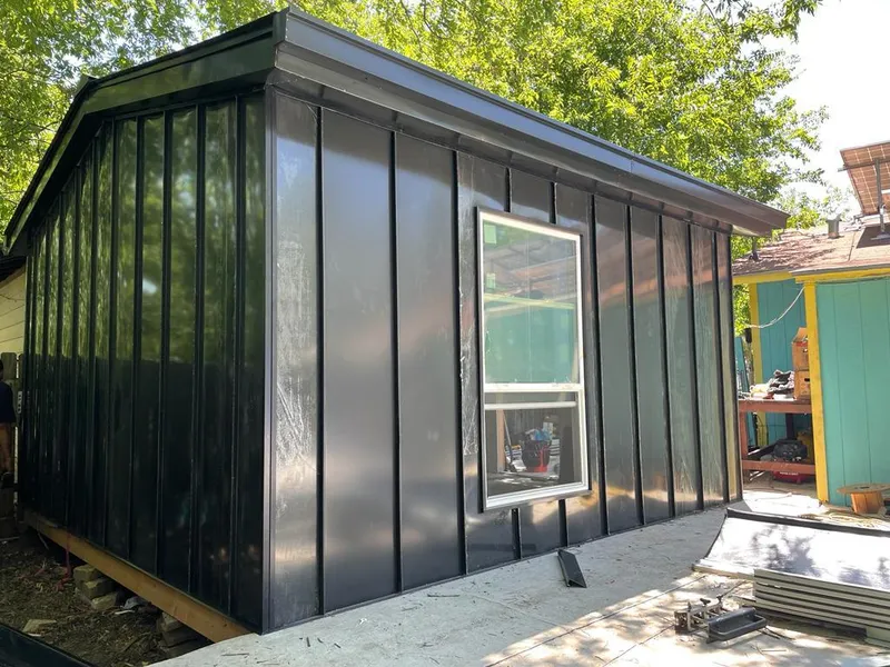 Black standing seam metal wall panels for Metal Roof Installation in Tyrone